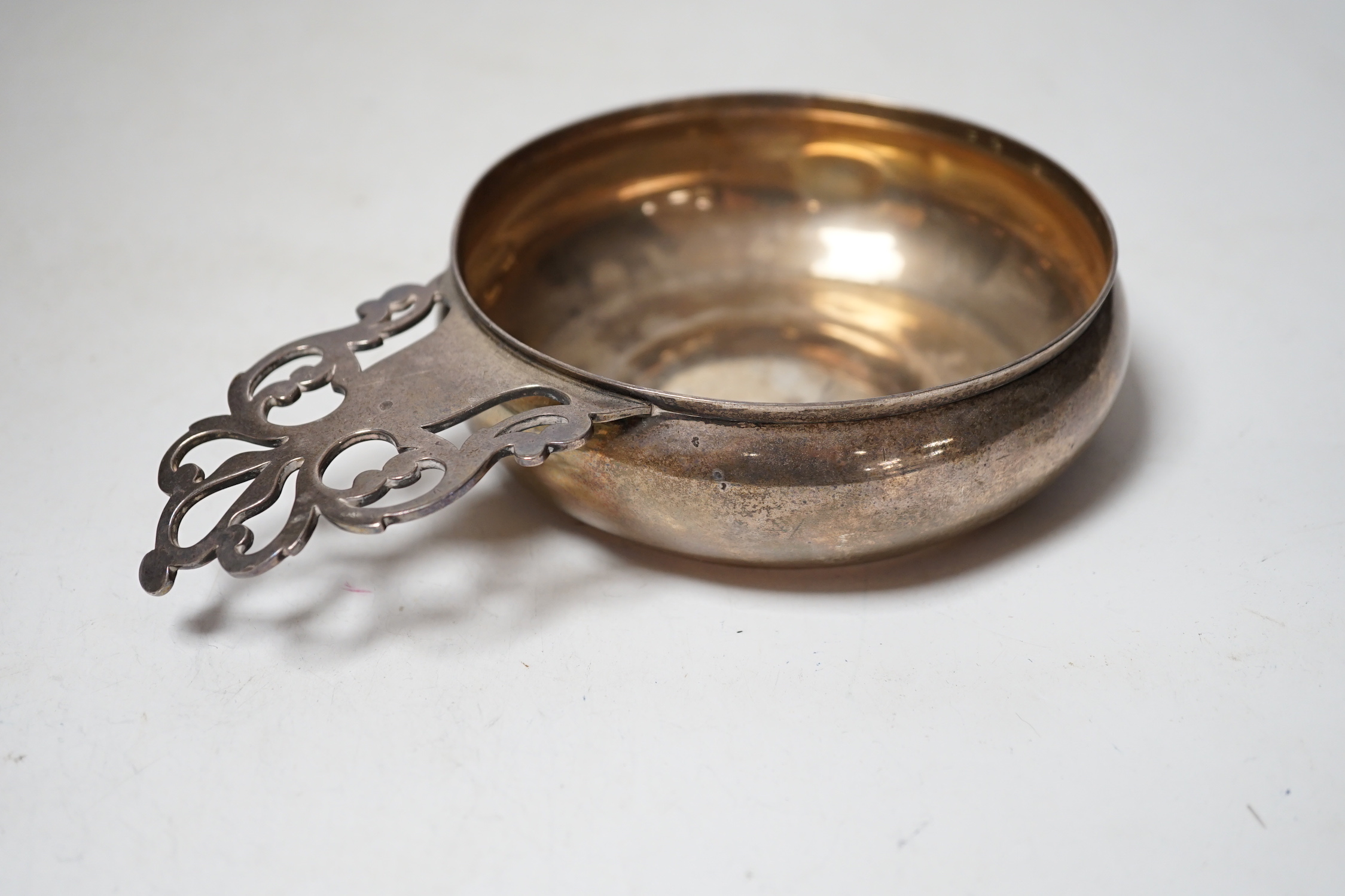 A Tiffany & Co sterling bleeding bowl, a replica of the original in the Clearwater Collection by Paul Revere, 19.3cm including handled, 7.8oz.
